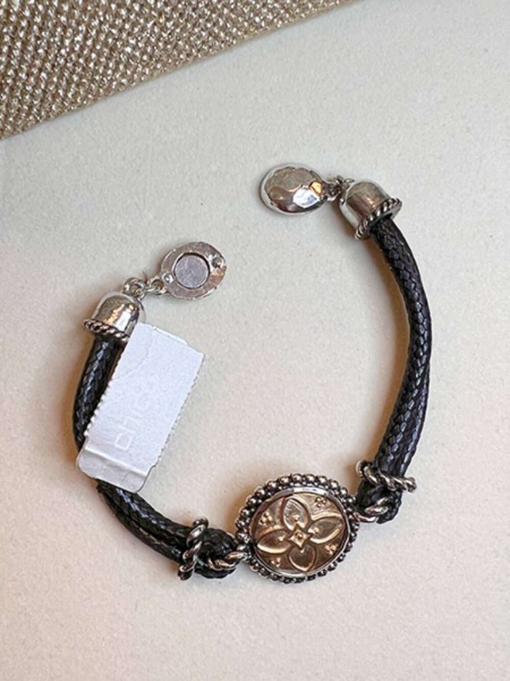 Chico's Braided Leather Bracelet with a Striking, Reversible Medallion. NWT